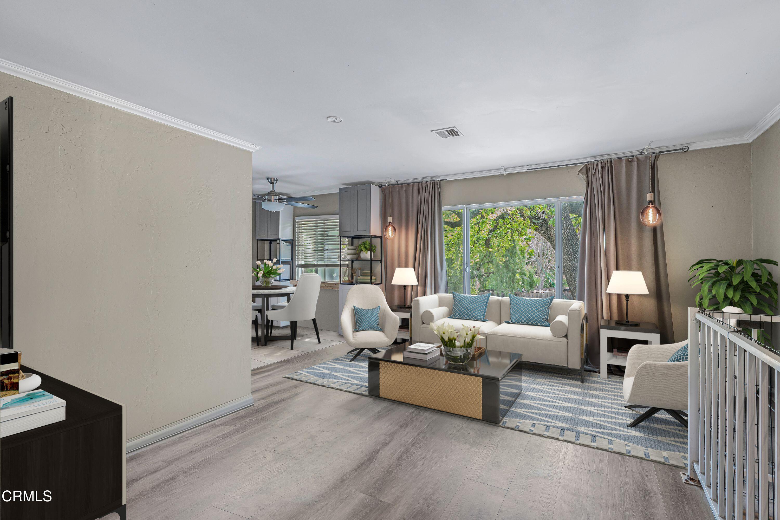 6045 Oak Knolls Road Simi Valley, CA 93063 - Photo 5 of 25 a living room with furniture and a large window