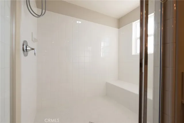 a utility room with sink dryer and washer