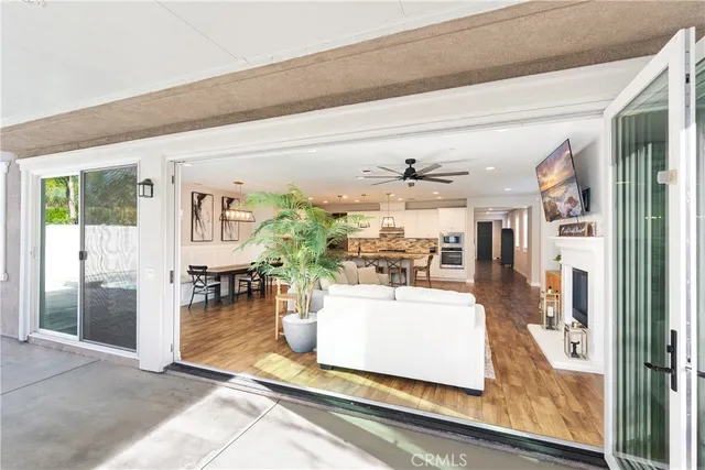 a living room with furniture and a table