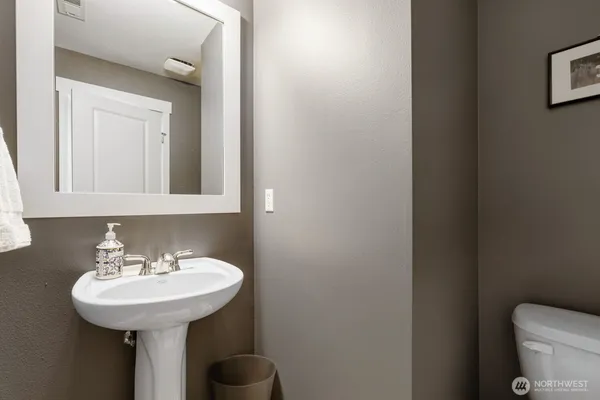 a bathroom with a sink and a toilet