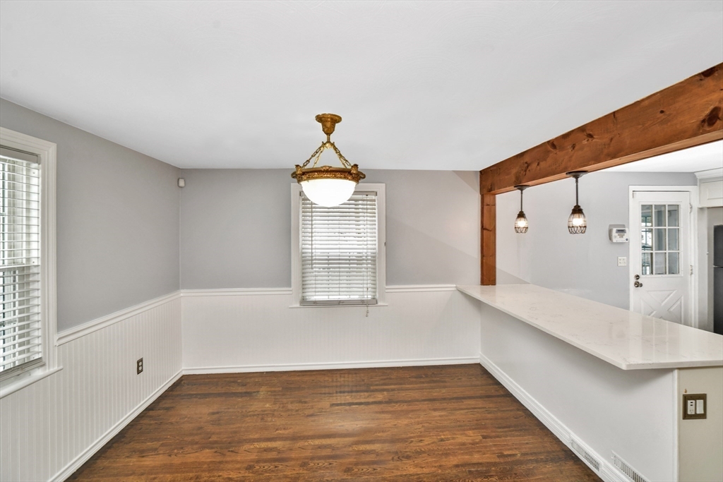 153 Colburn Street Dedham, MA 02026 - Photo 13 of 40 a view of an empty room and window