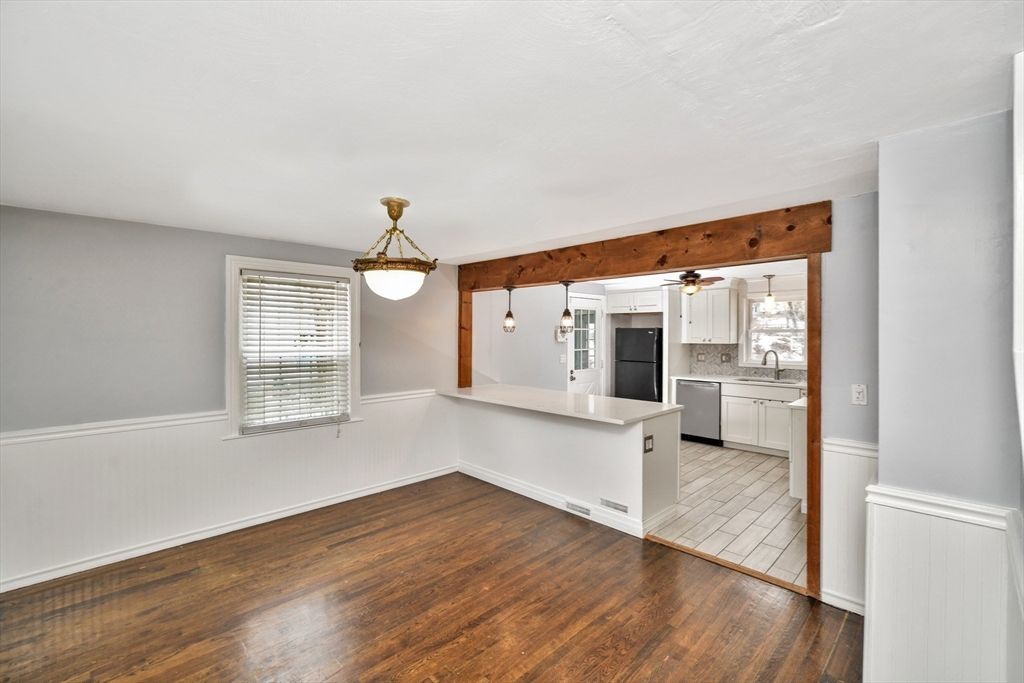 153 Colburn Street Dedham, MA 02026 - Photo 14 of 40 wooden floor in an empty room with a window
