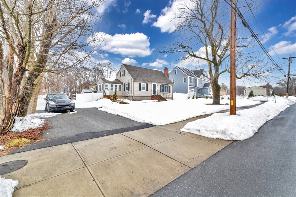 153 Colburn Street Dedham, MA 02026 - Photo 2 of 40 a view of city with tall buildings