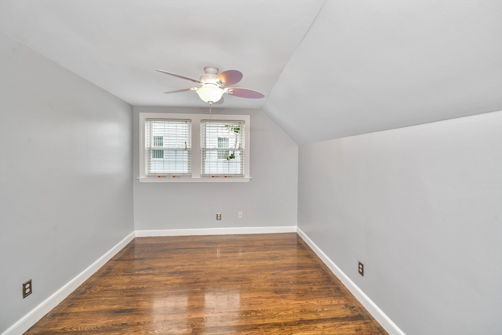 153 Colburn Street Dedham, MA 02026 - Photo 23 of 40 an empty room with a window