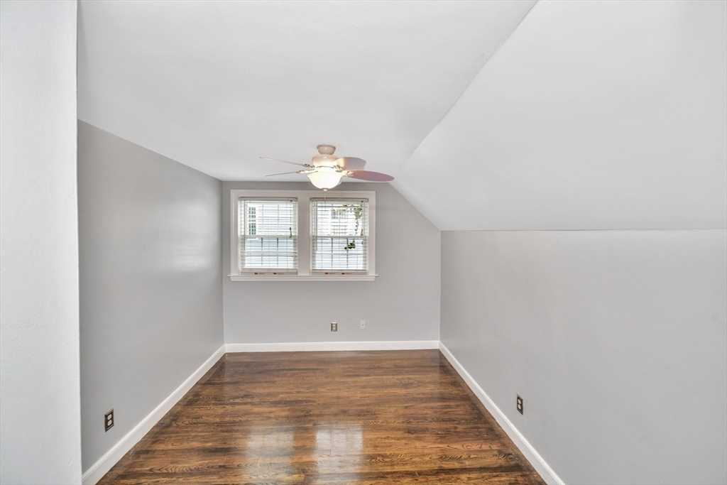 153 Colburn Street Dedham, MA 02026 - Photo 26 of 40 a view of empty room with wooden floor