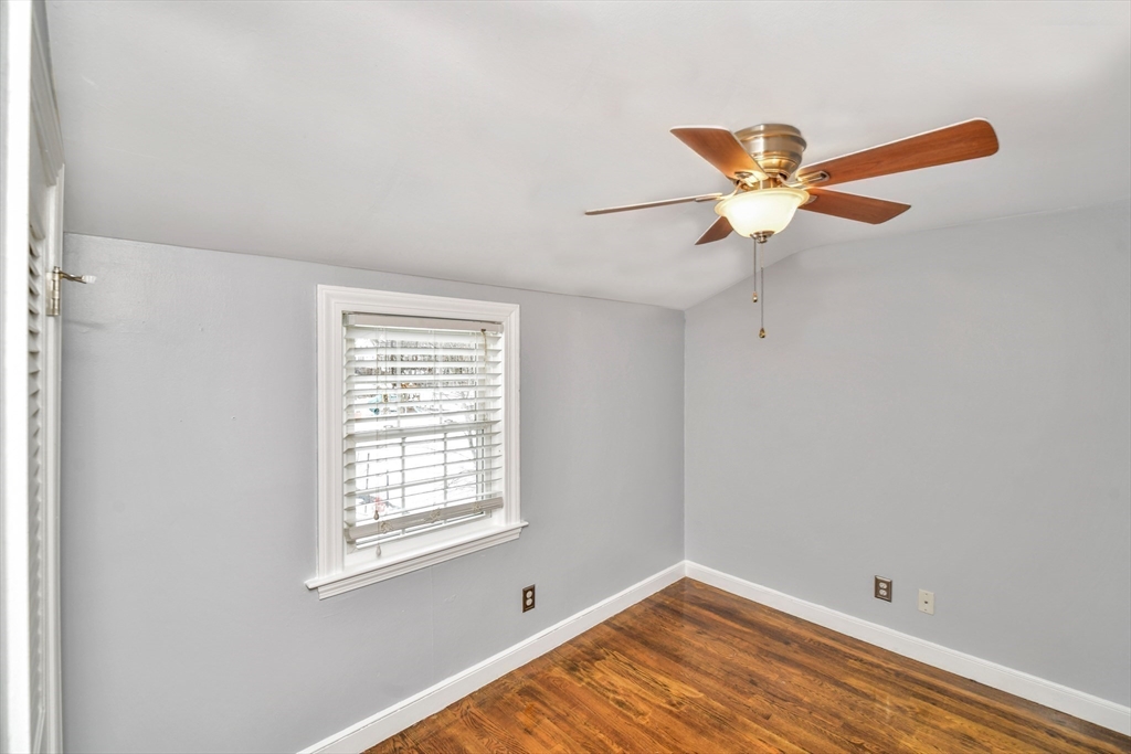 153 Colburn Street Dedham, MA 02026 - Photo 27 of 40 a view of an empty room with a window