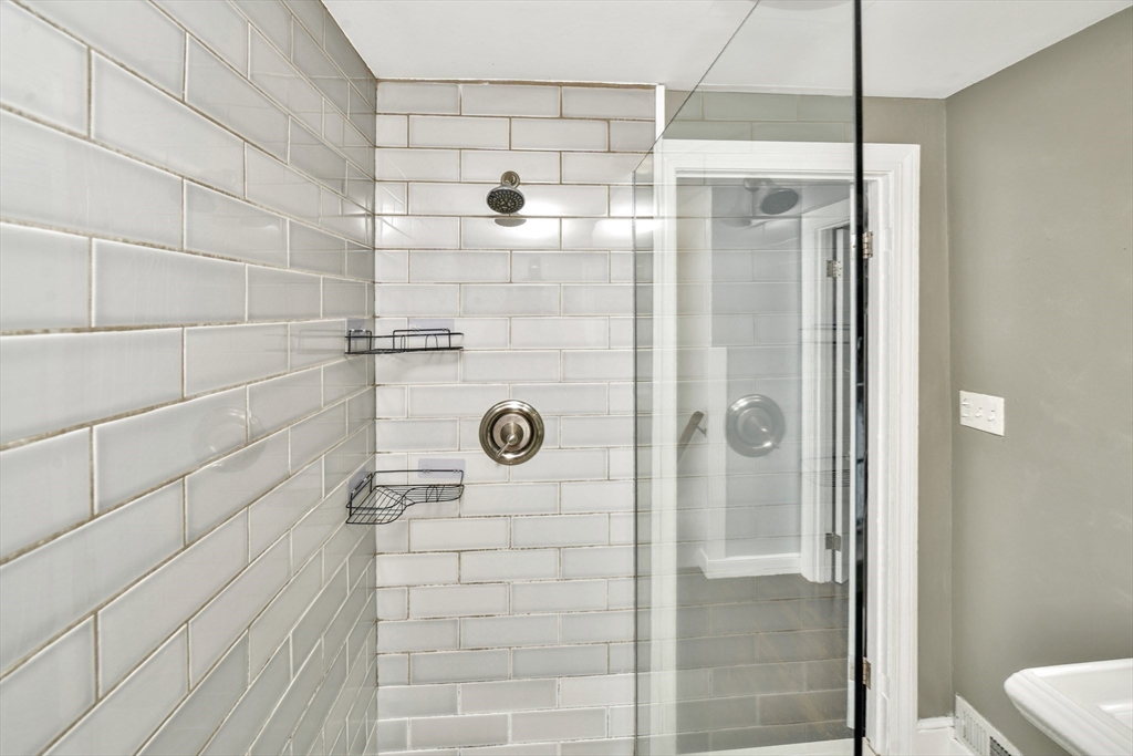 153 Colburn Street Dedham, MA 02026 - Photo 34 of 40 a bathroom with a shower