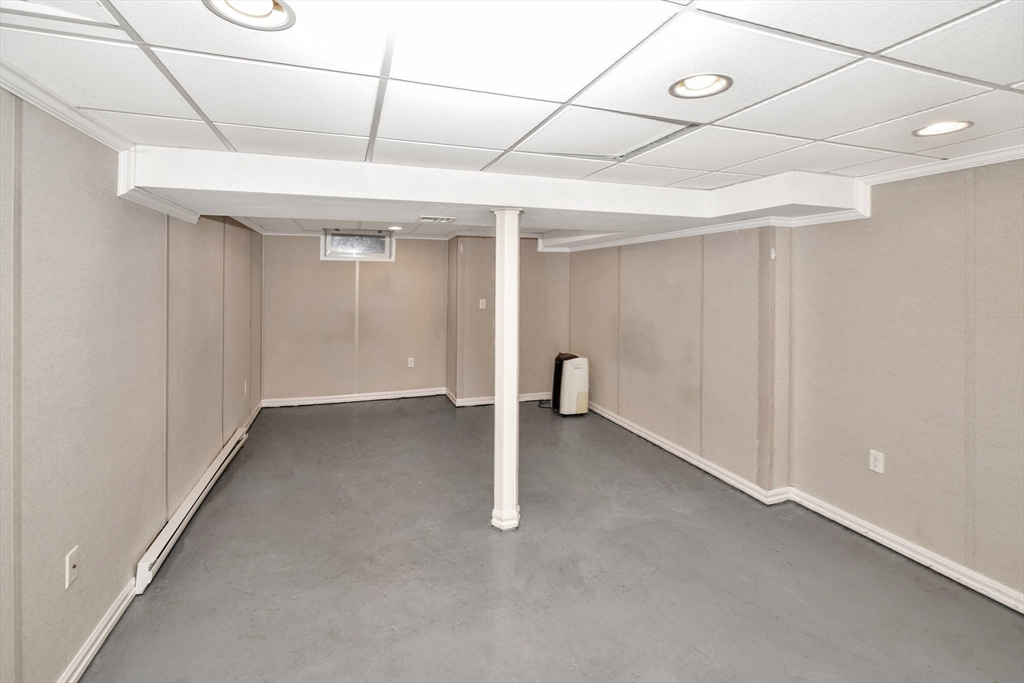 153 Colburn Street Dedham, MA 02026 - Photo 35 of 40 a view of a room with a bench