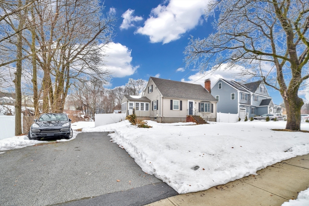 153 Colburn Street Dedham, MA 02026 - Photo 39 of 40 a view of a house with snow on the road