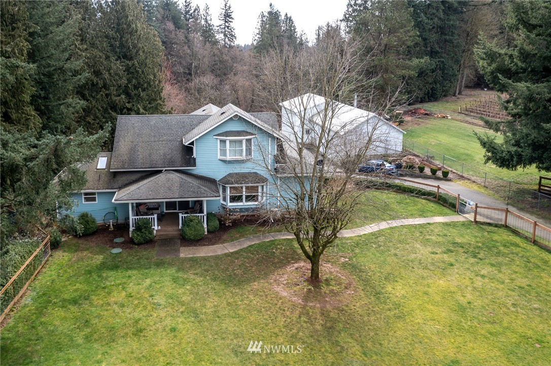 843 Loomis Trail Road Lynden, WA 98264 - Photo 1 of 33 a view of a house with a yard patio and deck