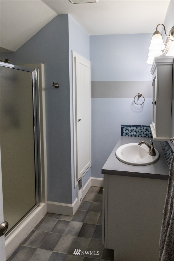 843 Loomis Trail Road Lynden, WA 98264 - Photo 22 of 33 a bathroom with a sink and a mirror