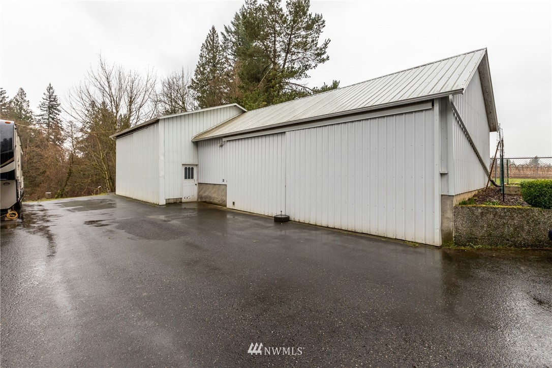 843 Loomis Trail Road Lynden, WA 98264 - Photo 23 of 33 a view of a house with a garage