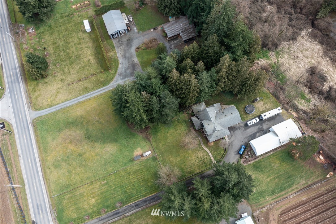 843 Loomis Trail Road Lynden, WA 98264 - Photo 24 of 33 an aerial view of a residential houses with outdoor space