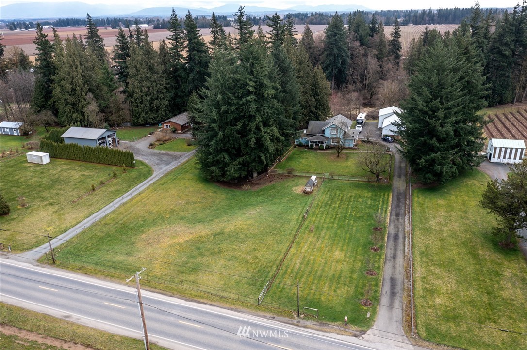 843 Loomis Trail Road Lynden, WA 98264 - Photo 27 of 33 a view of swimming pool from a lake