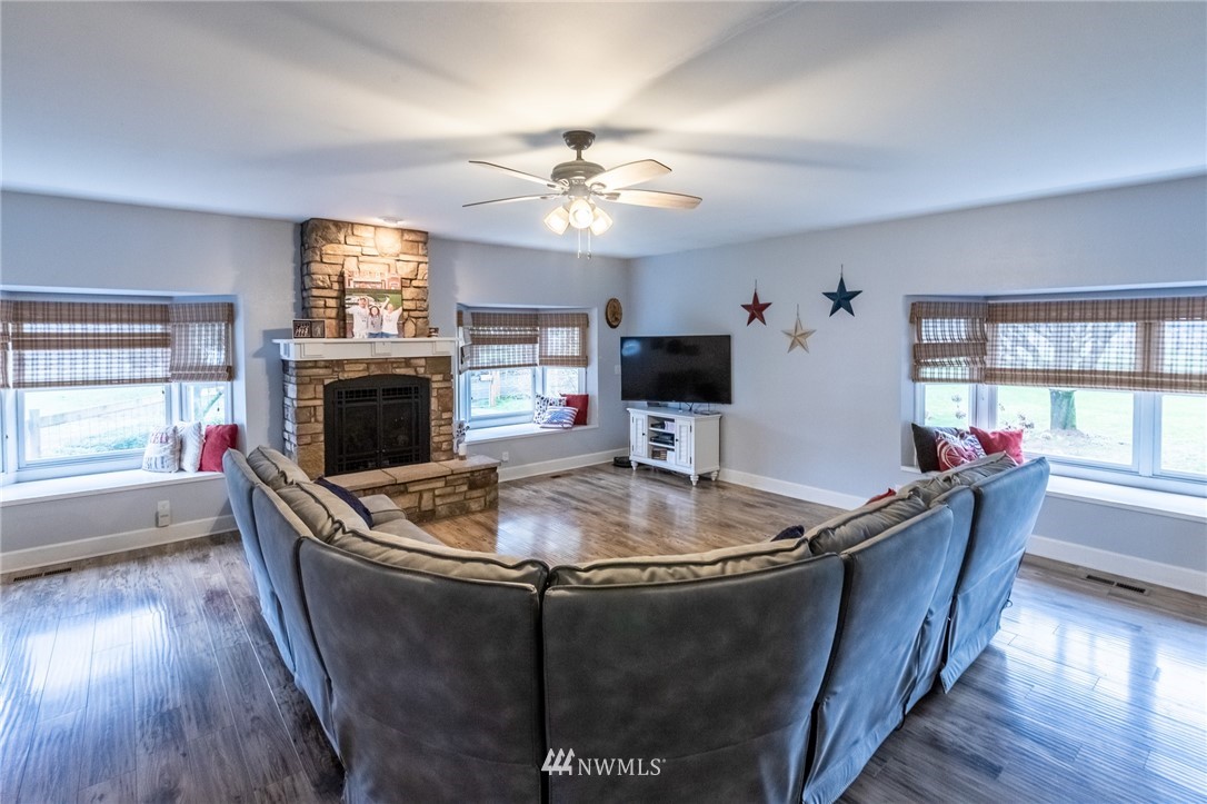 843 Loomis Trail Road Lynden, WA 98264 - Photo 6 of 33 a living room with furniture and a fireplace