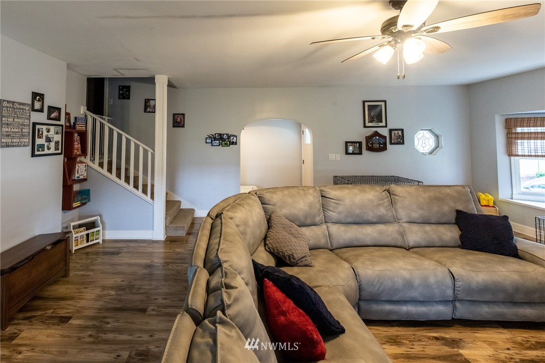843 Loomis Trail Road Lynden, WA 98264 - Photo 8 of 33 a living room with furniture and a wooden floor