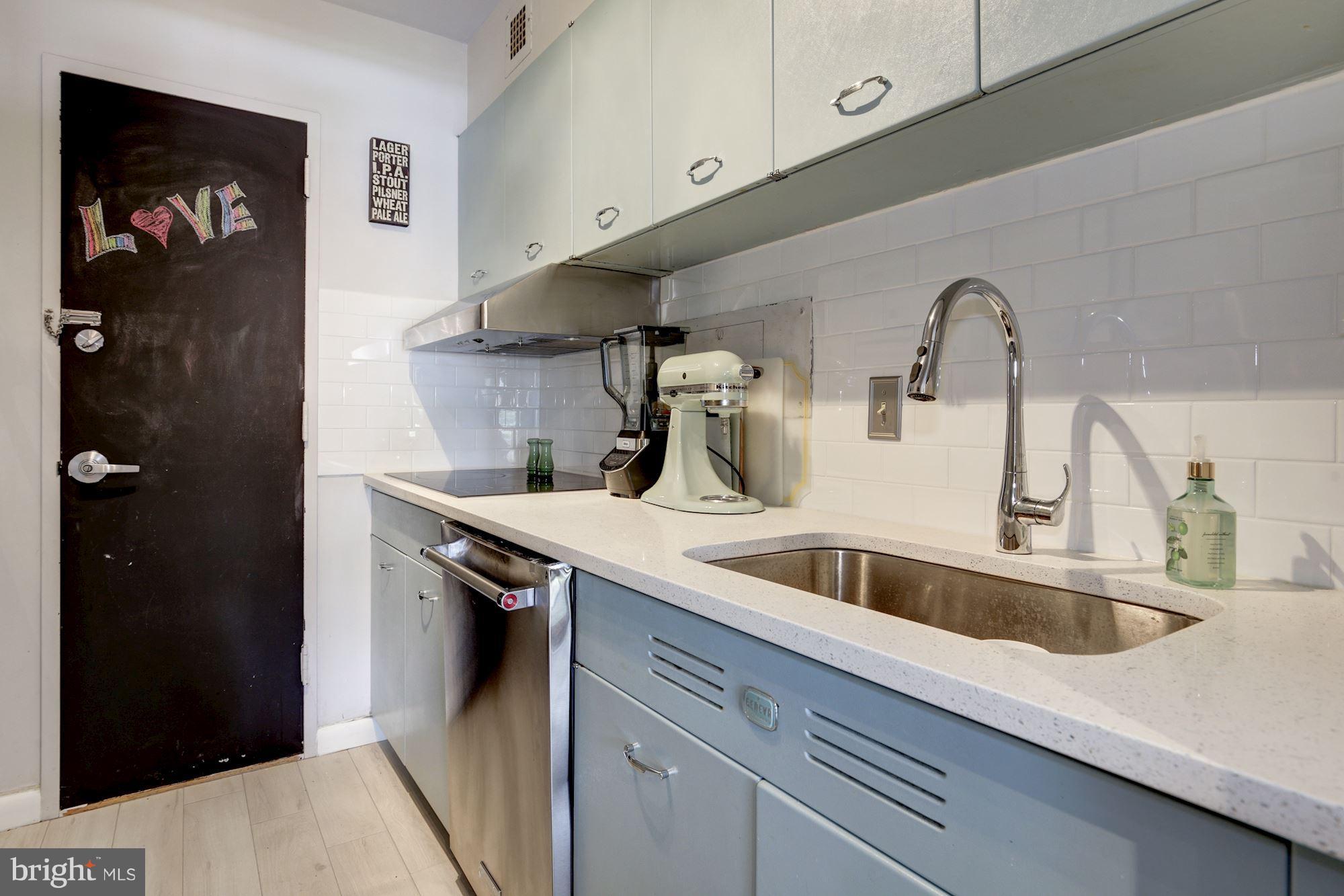 560 N Street Southwest, Unit N409 Washington, DC 20024 - Photo 9 of 21 Renovated Kitchen with Corian and new appliances