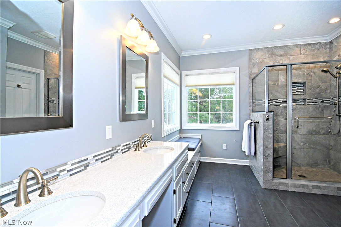 659 Sunridge Road Fairlawn, OH 44333 - Photo 14 of 35 Master bath updated with granite, cabinetry, faucets, backsplash and tile flooring