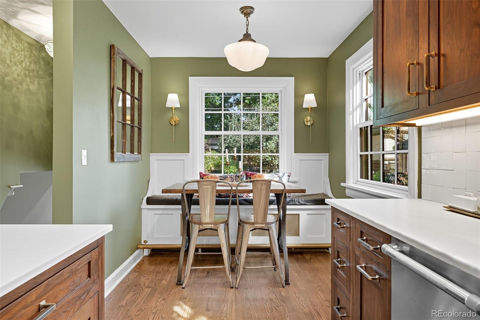 1750 Jasmine Street Denver, CO 80220 - Photo 13 of 35 a view of a dining room with furniture window and wooden floor