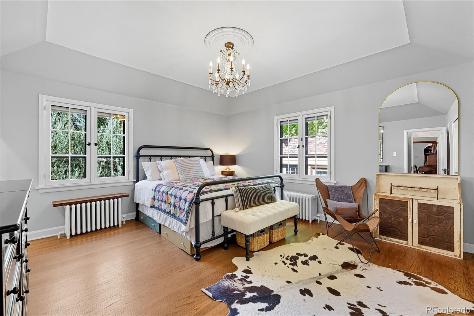 1750 Jasmine Street Denver, CO 80220 - Photo 14 of 35 a bedroom with furniture and a window