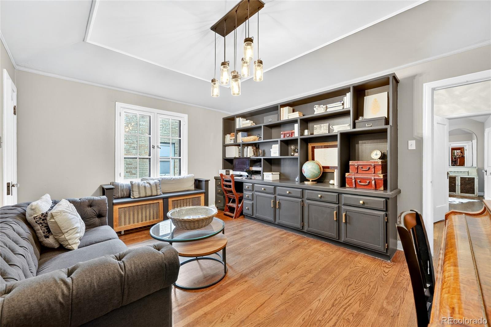 1750 Jasmine Street Denver, CO 80220 - Photo 18 of 35 a living room with furniture and a window