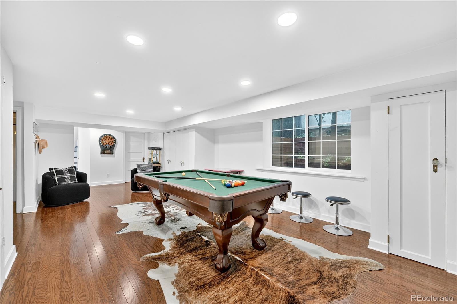 1750 Jasmine Street Denver, CO 80220 - Photo 20 of 35 a room with furniture pool table and wooden floor