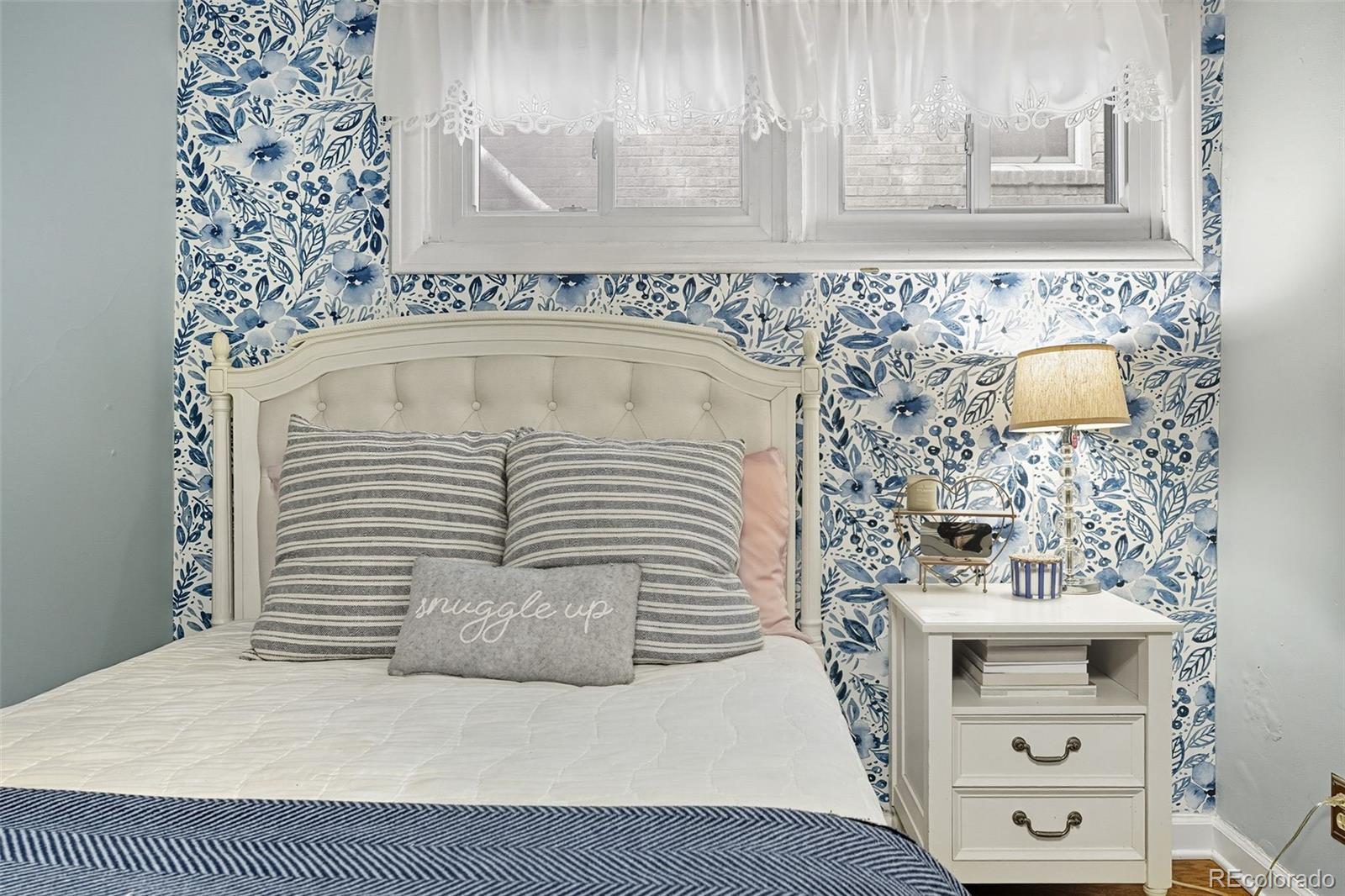 1750 Jasmine Street Denver, CO 80220 - Photo 25 of 35 a bathroom with a sink and a mirror