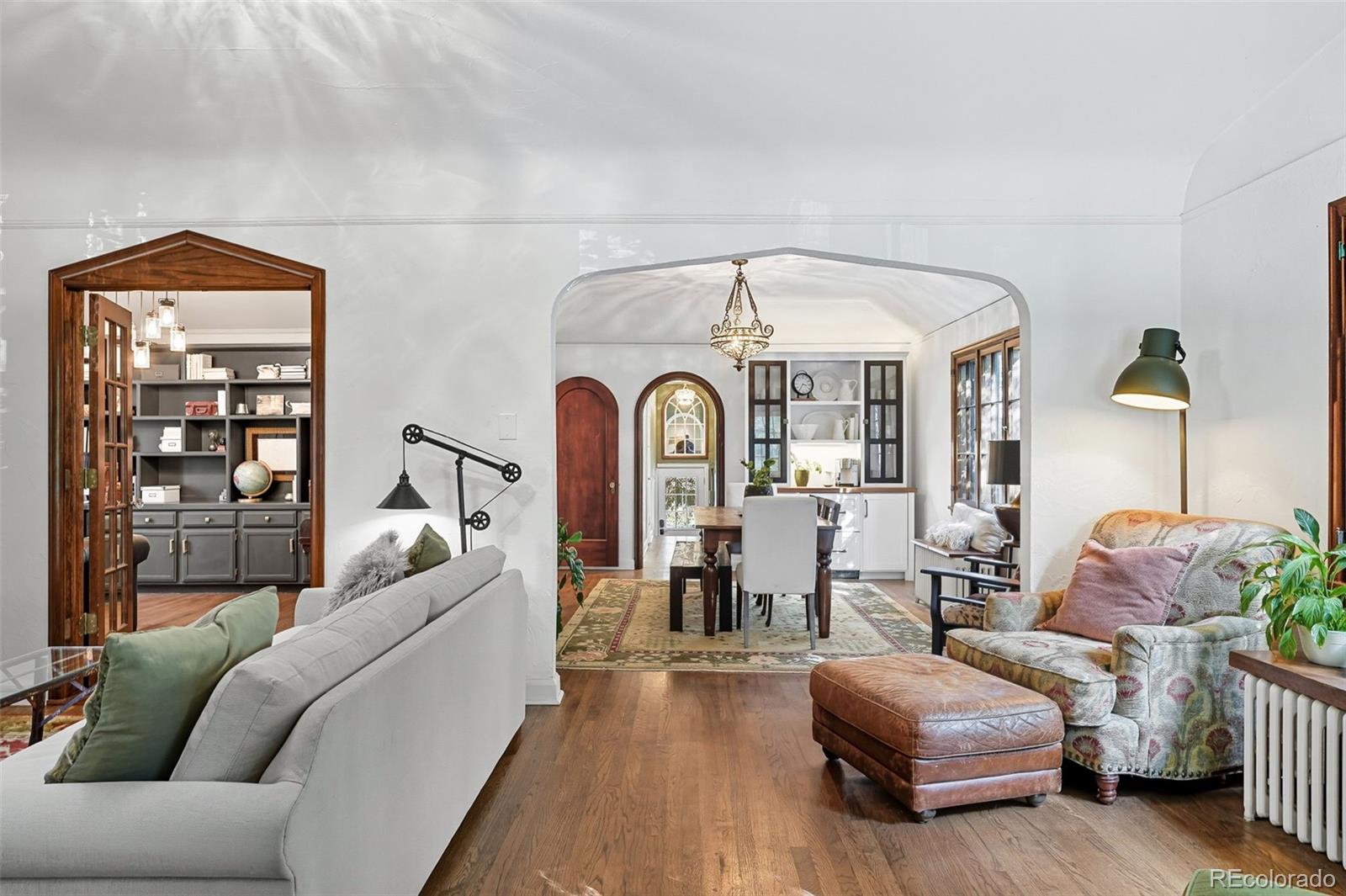 1750 Jasmine Street Denver, CO 80220 - Photo 7 of 35 a living room with furniture and a large window