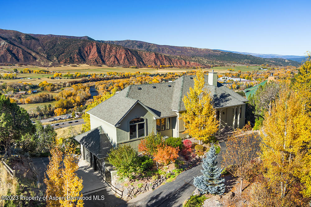 587 Hillcrest Drive Basalt, CO 81621 - Photo 18 of 29 a view of a house with a yard