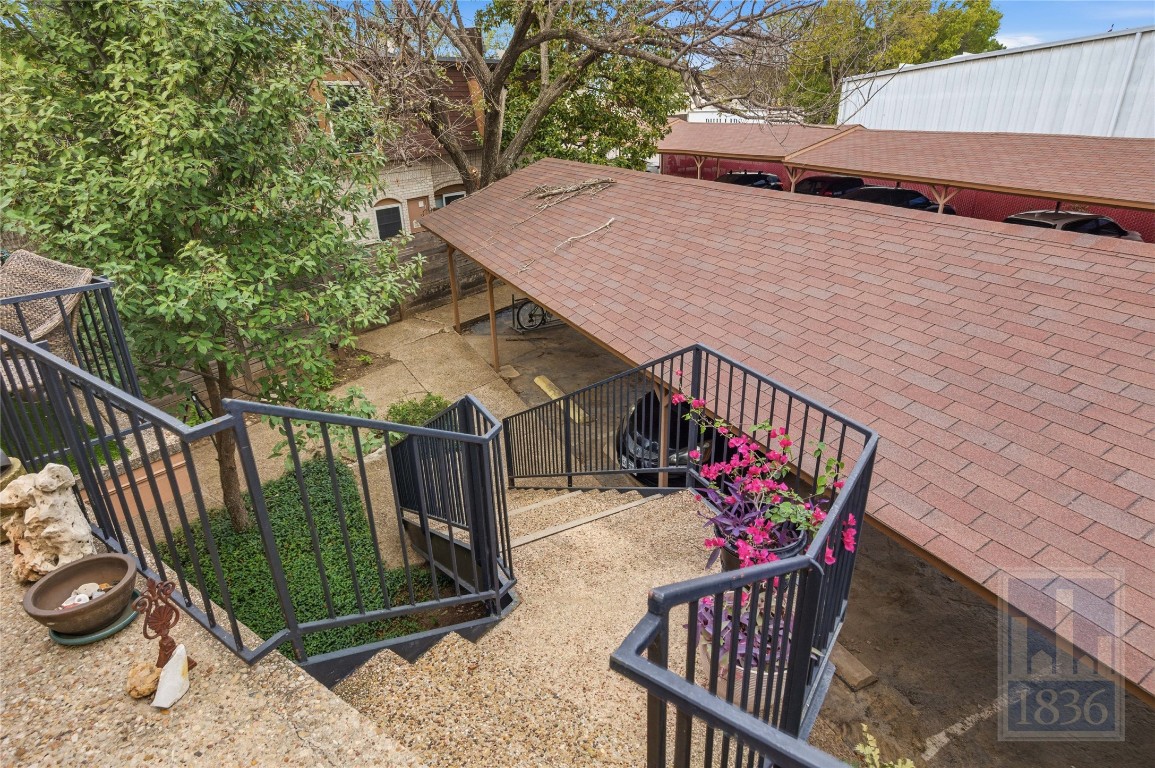 7801 Shoal Creek Boulevard, Unit 256 Austin, TX 78757 - Photo 21 of 27 a view of balcony with wooden floor and potted plants