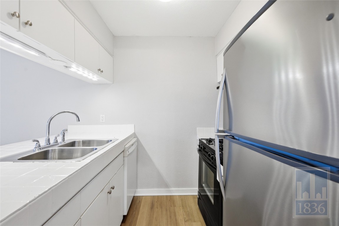 7801 Shoal Creek Boulevard, Unit 256 Austin, TX 78757 - Photo 10 of 27 a close view of sink and tap