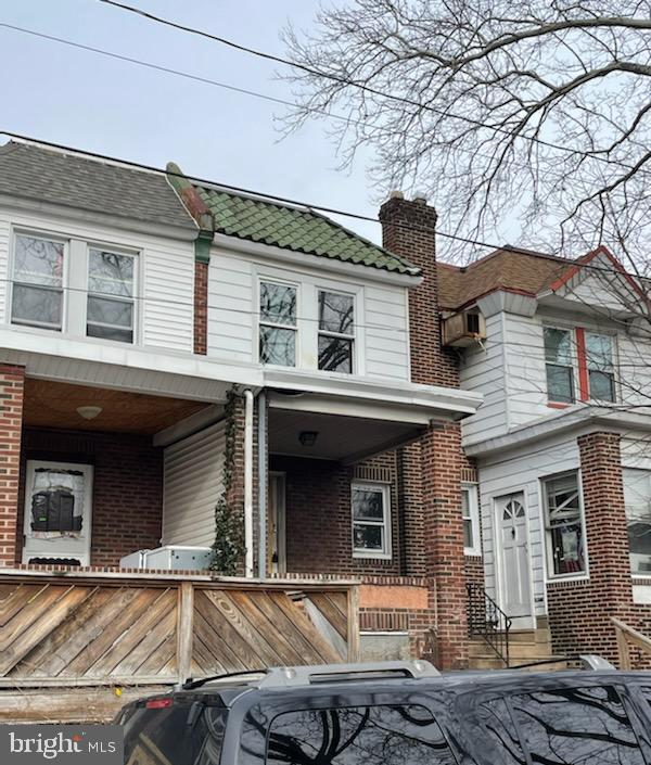 a front view of a house with yard