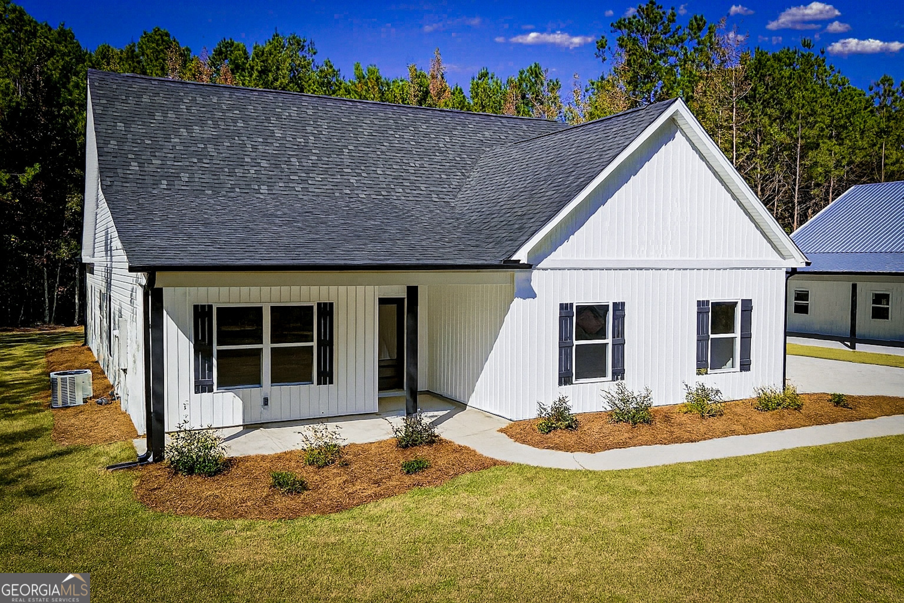 2114 Allie Road Greenville, GA 30222 - Photo 1 of 48 a view of a house with backyard and sitting area