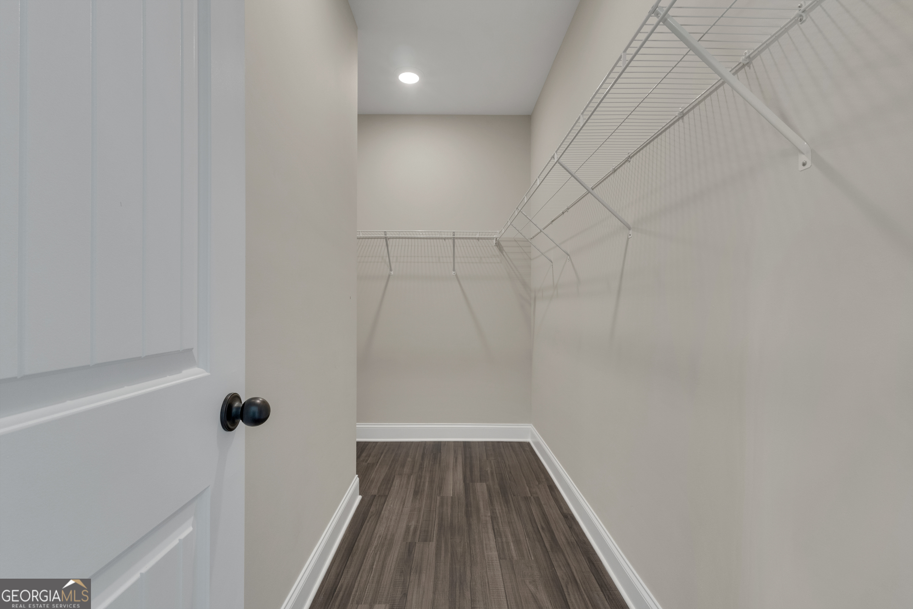 2114 Allie Road Greenville, GA 30222 - Photo 22 of 48 a view of a room with wooden floor and white walls