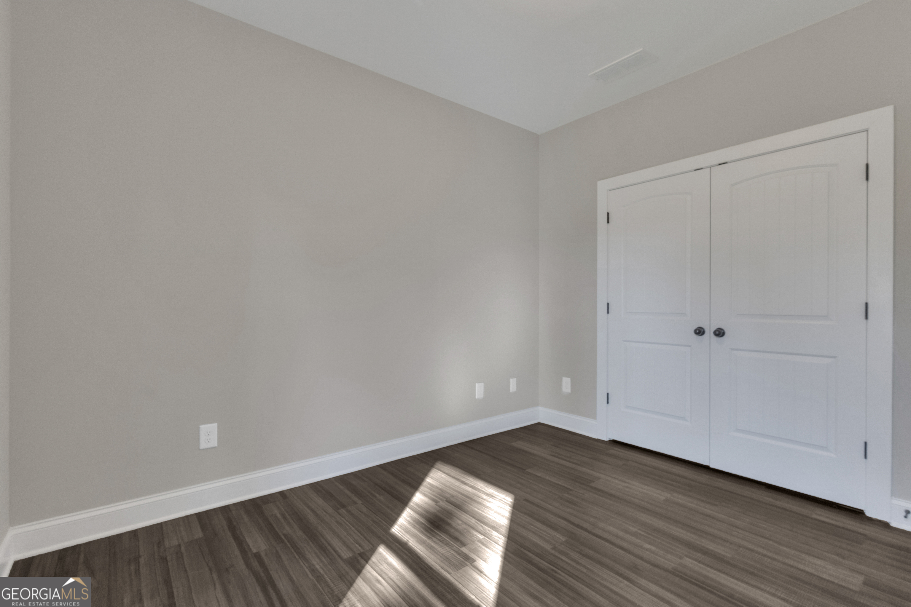 2114 Allie Road Greenville, GA 30222 - Photo 28 of 48 a view of an empty room and wooden floor