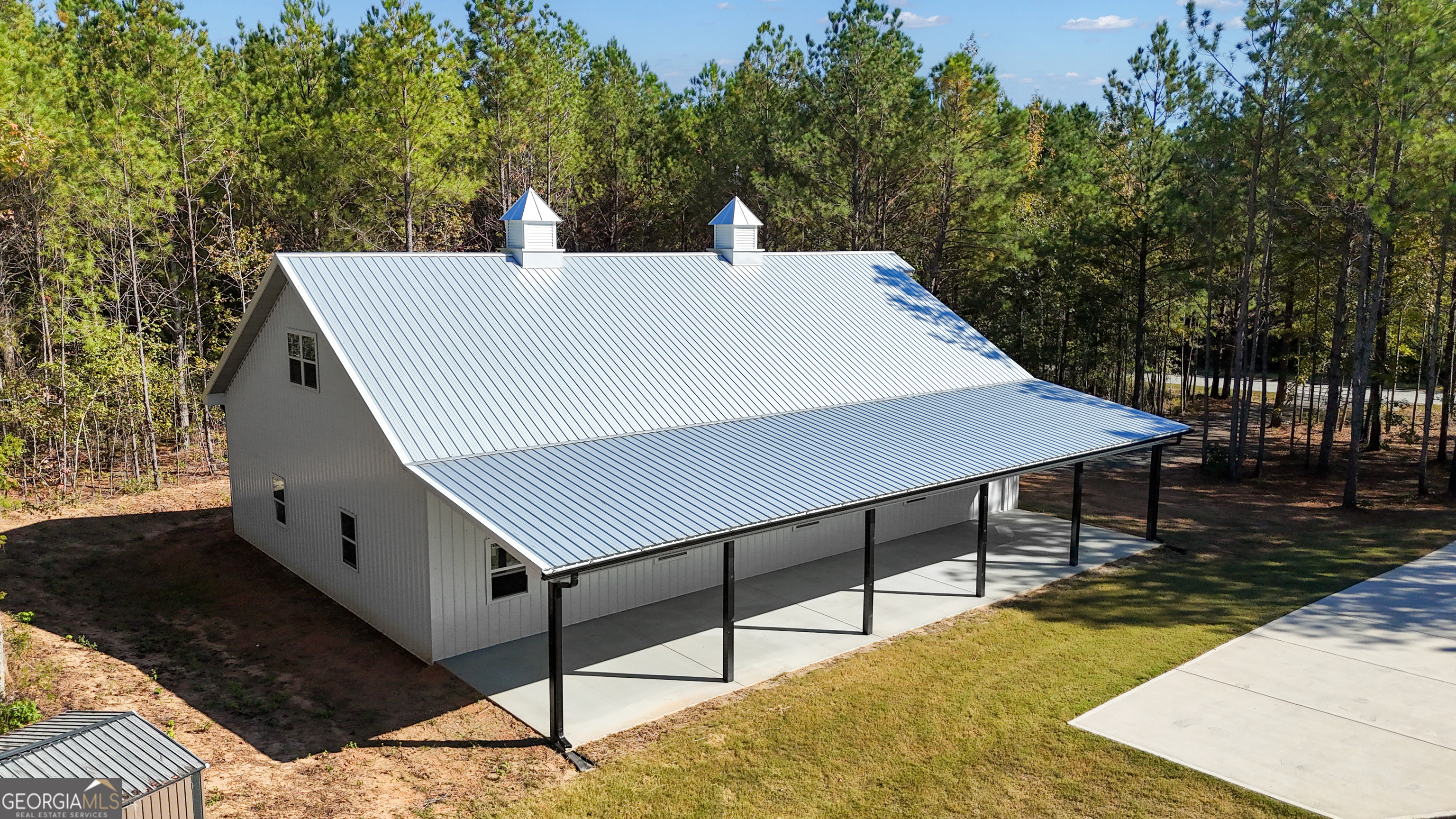 2114 Allie Road Greenville, GA 30222 - Photo 48 of 48 a terrace of a house with wooden floor and outdoor seating