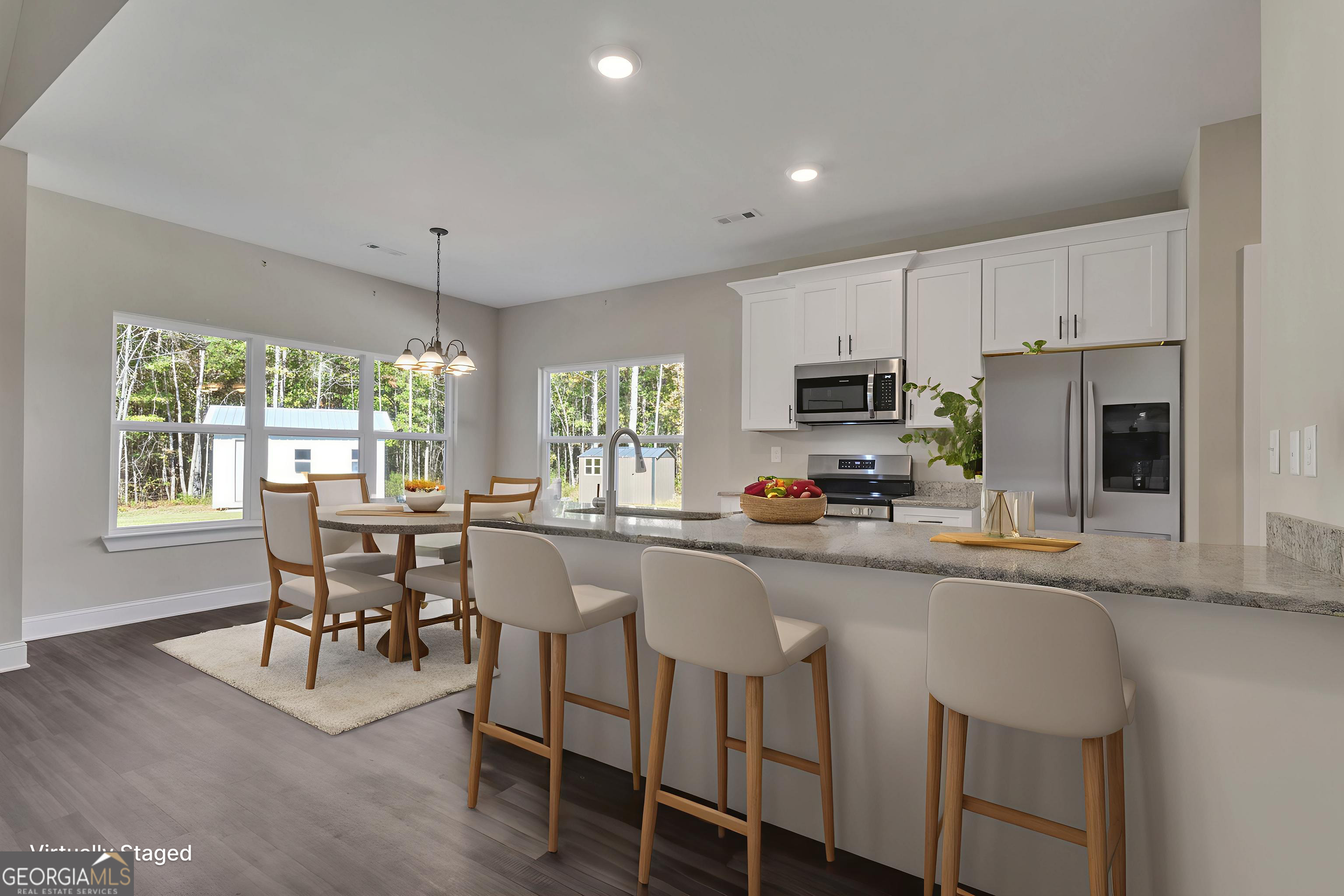 2114 Allie Road Greenville, GA 30222 - Photo 6 of 48 a kitchen with sink a microwave and cabinets