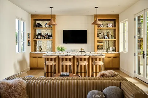 a view of a livingroom with furniture and a fireplace