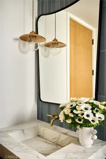 a bedroom with a bed and a fireplace