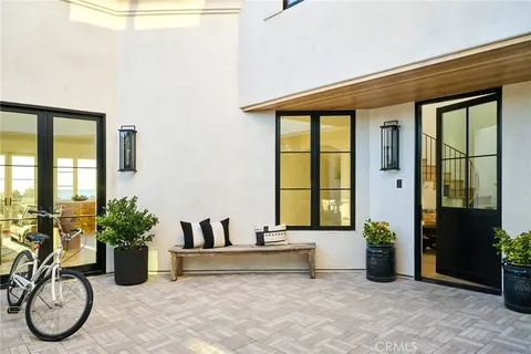 a living room with furniture and windows