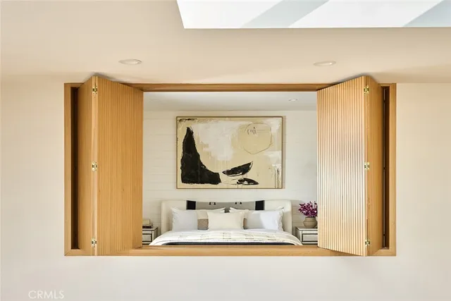 a white tub sitting next to a bathroom