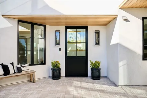 a view of a entryway door front of house