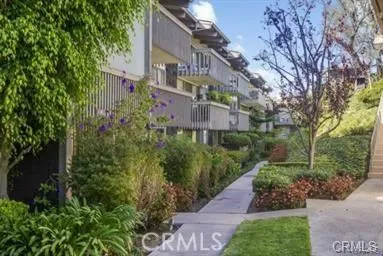 a view of a building with a yard