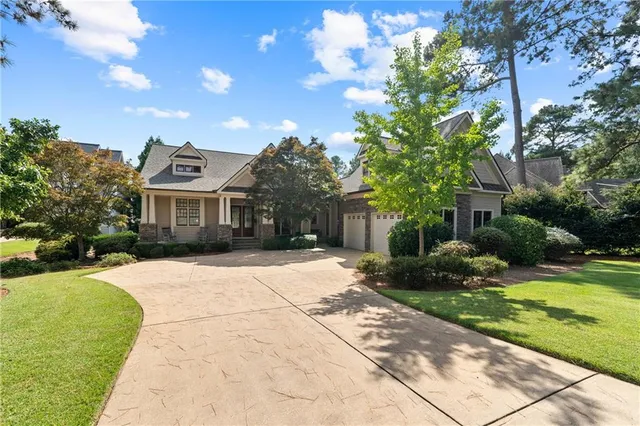 a view of a patio with couches table and chairs