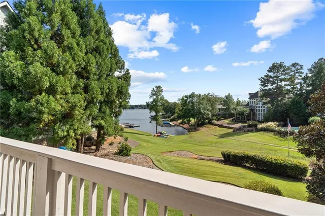a living room with fireplace furniture and a wooden floor