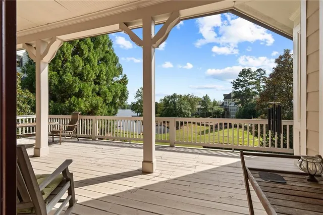 a living room with furniture fireplace and window