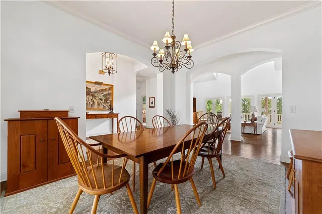 a view of a livingroom with furniture and a flat screen tv
