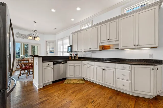 a bathroom with a toilet a sink and shower