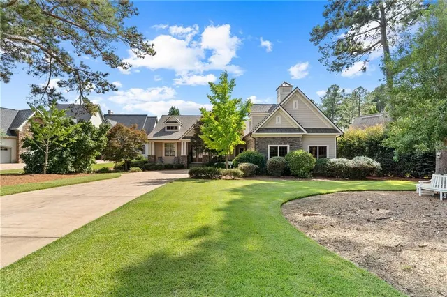 a building outdoor space with patio furniture and potted plants
