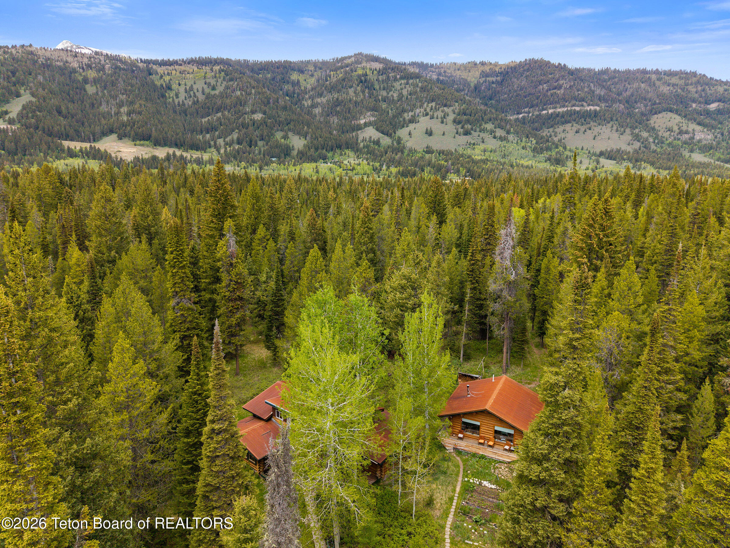 6475 Heck Of A Hill Road Wilson, WY 83014 - Photo 4 of 36 4 Drone View North_Email